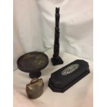 FOUR ITEMS TO INCLUDE A CARVED MINATURE TOTEM POLE, SMALL COW BELL, A BLACK BOX WITH WHITE METAL