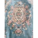 A LARGE FLORAL CHINESE CARPET, 144 X 107" (A/F)