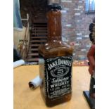 A LARGE PLASTIC JACK DANIELS MONEY BOX