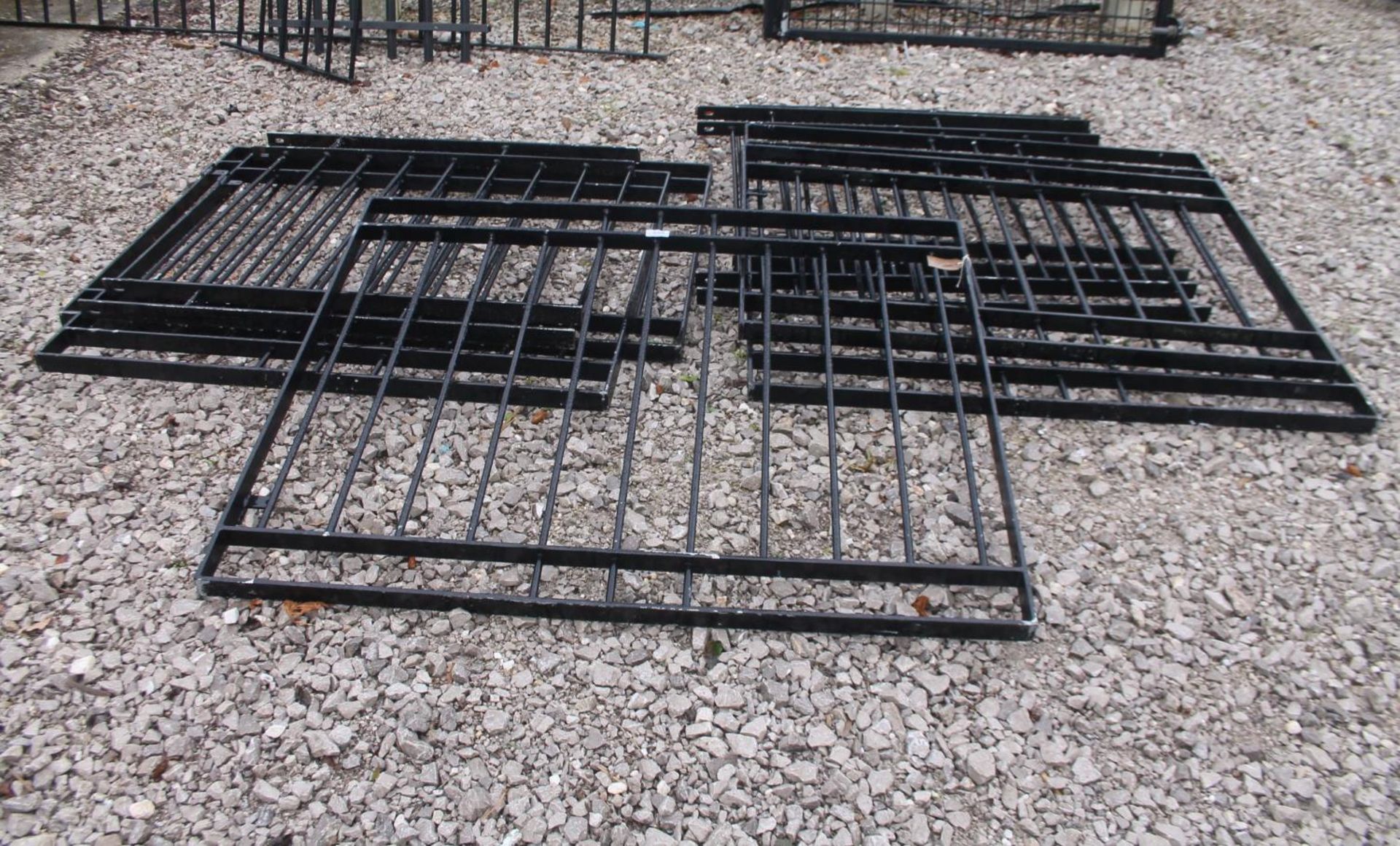 THREE METAL GATES AND SIX METAL SECTIONS OF FENCING NO VAT