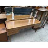 A MID 20TH CENTURY TEAK TRIPLE MIRROR DRESSING TABLE, 56" WIDE