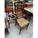 A PAIR OF OAK ARTS & CRAFTS BEDROOM CHAIRS AND LANCASHIRE LADDERBACK CHAIR