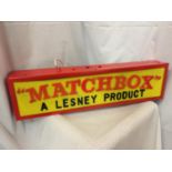 AN ILLUMINATED MATCHBOX LESNEY PRODUCT SIGN