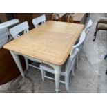 A PAINTED PINE KITCHEN TABLE WITH FOUR CHAIRS