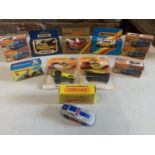 A COLLECTION OF BOXED AND UNBOXED MATCHBOX VEHICLES - ALL MODEL NUMBER 21 OF VARIOUS ERAS AND