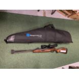 A STOEGER F40 .22 AIR RIFLE WITH STOEGER 3-9 X 40 LASER TELESCOPIC SIGHTS AND GUN SLEEVE
