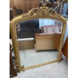 A 19TH CENTURY GILT FRAMED OVERMANTEL MIRROR, 54 X 53"