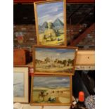 THREE FRAMED SCENES OF THE DESERT FEATURING CAMELS, ARABS, ETC