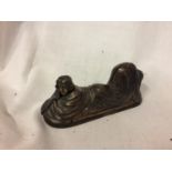 A COLD PAINTED BRONZE OF A LADY IN A BLANKET LENGTH APPROXIMATELY 14CM