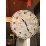 A GLASS FRONTED GLOBE/MAP STYLE WALL CLOCK