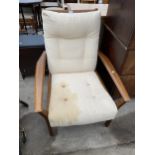 A PARKER KNOLL STYLE FIRESIDE CHAIR