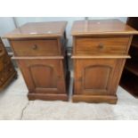 A PAIR OF MODERN HARDWOOD POT CUPBOARDS WITH SINGLE DRAWERS