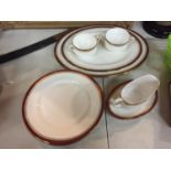 A QUANTITY OF SERVING AND DINNER PLATES, GRAVY BOAT AND TWIN HANDLED CUPS MADE BY PARAGON IN THE