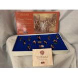 A BOXED BRITIANS SCOTS GUARDS BAND OF THE PIPES AND DRUMS 1899 MODEL SOLDIER SET NUMBER 00214