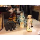 A WOODEN ELEPHANT, TWO CERAMIC CONTINENTAL STYLE FIGURES , ETC