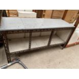 A GARAGE/SHED WORK BENCH WITH LOWER SHELF