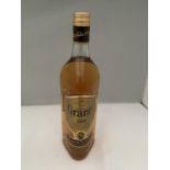 A 1 LITRE BOTTLE OF GRANTS FINEST SCOTCH WHISKY SUPERIOR STRENGTH 100% US PROOF