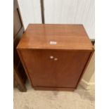 A RETRO TEAK STORGE CHEST ENCLOSING 10 PULL-OUT DRAWERS EACH WITH TWENTY-FIVE COMPARTMENTS,