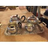 A SONA CHROME TEASET INCLUDING A TEA AND WATER POT, CREAM JUG, SUGAR BOWLAND TRAY MADE BY N. C. J.