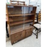 A MID 20TH CENTURY OAK BOOKCASE WITH GLASS SLIDING DOORS, 36" WIDE