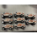 EIGHT TOKYO GIANTS DIECAST VEHICLES TO INCLUDE THE PLASYERS NAME AND NUMBER TO THE SIDE OF THE VANS