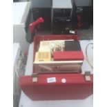 A RETRO BERNINA SEWING MACHINE WITH FOOT PEDDLE AND CARRY CASE