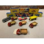 A COLLECTION OF BOXED AND UNBOXED MATCHBOX VEHICLES - ALL MODEL NUMBER 40 OF VARIOUS ERAS AND
