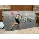 A PAINTED AREOPLANE SIDE PANEL FETURING 'MISS B'HAVIN'