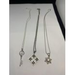 THREE MARKED SILVER NECKLACES WITH PENDANTS TO INCLUDE A SNOWFLAKE WITH CELAR STONE, A KEY WITH