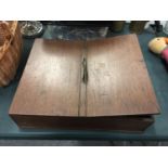 A MAHOGANY TWO SIDED BOX CONTAING AN AMOUNT OF VINTAGE FORKS, SPOONS, ETC