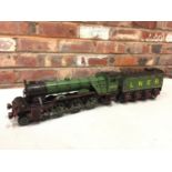 A TIN PLATE MODEL LNER 4-4-2 LOCOMOTIVE AND TENDER - TOTAL LENGTH 66 CM