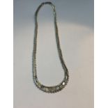 A MARKED SILVER GRADUATED NECKLACE