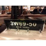 A MIRRORS GLASS NEW YORK NUMBER PLATE STYLE COAT HOOK