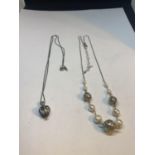 TWO MARKED SILVER NECKLACES TO INCLUDE A SILVER BALL AND PEARL DESIGN AND AN ENCLOSED PEARL PENDANT