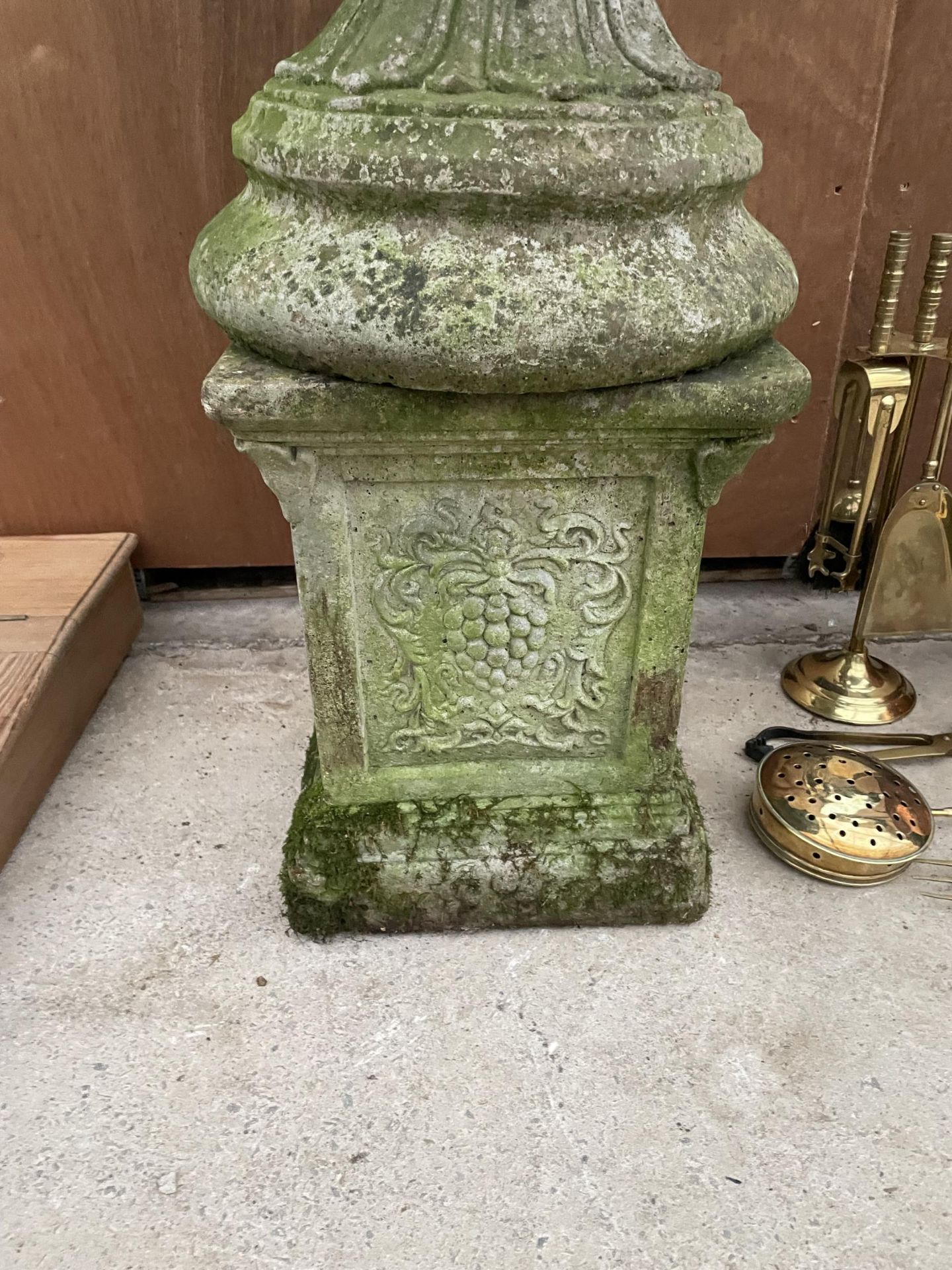 A RECONSTITUTED STONE URN PLANTER ON PEDASTEL BASE WITH LIONS HEAD DECORATION - Image 2 of 2