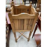 A VICTORIAN STYLE PINE JARDINIER STAND ON TURNED AND FLUTED LEGS