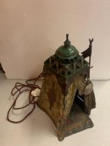 A BERGMAN STYLE COLD PAINTED BRONZE LAMP DEPICTING AN AFRICAN TRIBESMAN IN A TENT - HEIGHT
