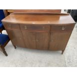 A STRONGBOW FURNITURE BOWFRONTED SIDEBOARD ENCLOSING THREE FRIEZE DRAWERS AND FOUR CUPBOARDS, 54"