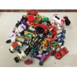 A LARGE AMOUNT OF TRANSFORMER STYLE, POWER RANGER STYLE AND OTHER ROBOT TOYS