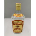 A 70CL BOTTLE OF GORDONS LONDON DRY GIN 40% VOL