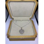 A 15 CARAT WHITE AND YELLOW GOLD LARGE DIAMOND ENCRUSTED HEART PENDANT WITH CHAIN LENGTH 44CM IN A