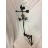 A CAST IRON WEATHER VANE WITH A COCKEREL FINIAL