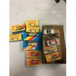 A COLLECTION OF BOXED AND UNBOXED MATCHBOX VEHICLES - ALL MODEL NUMBER 74 OF VARIOUS ERAS AND