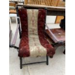 A VICTORIAN EBONISED CAMPAIGN CHAIR WITH TURNED SPINDLES