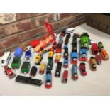 A LARGE QUANTITY OF TRAINS TO INCLUDE MOSTLY THOMAS THE TANK ENGINE