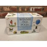 A COMPLETE BOXED SET OF WINNIE THE POOH BOOKS