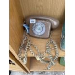 A RETRO LIGHT BROWN DIAL TELEPHONE