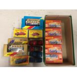 A COLLECTION OF BOXED AND UNBOXED MATCHBOX VEHICLES - ALL MODEL NUMBER 65 OF VARIOUS ERAS AND