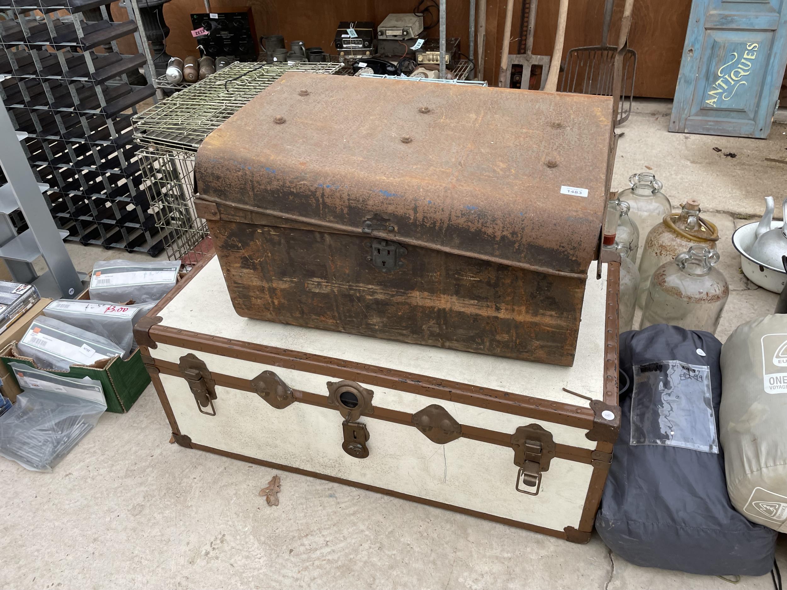 TWO VINTAGE TRAVEL TRUNKS AND THREE SLEEPING BAGS