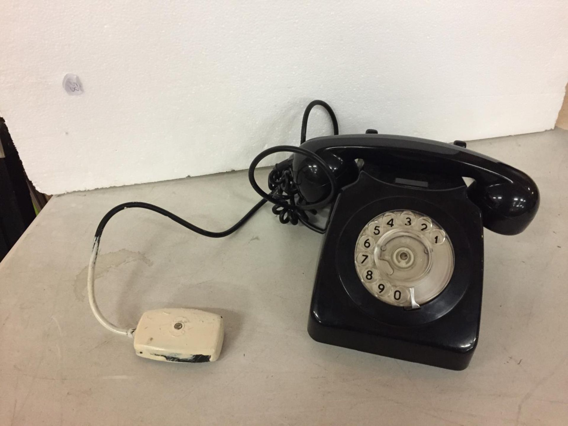 A BLACK VINTAGE DIAL TELEPHONE